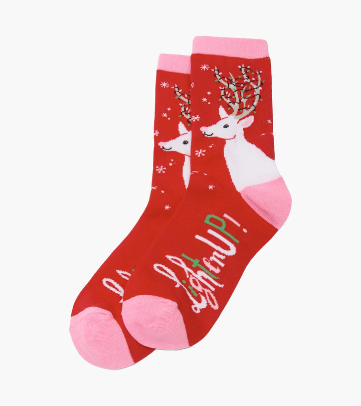 Red socks with reindeer design and &