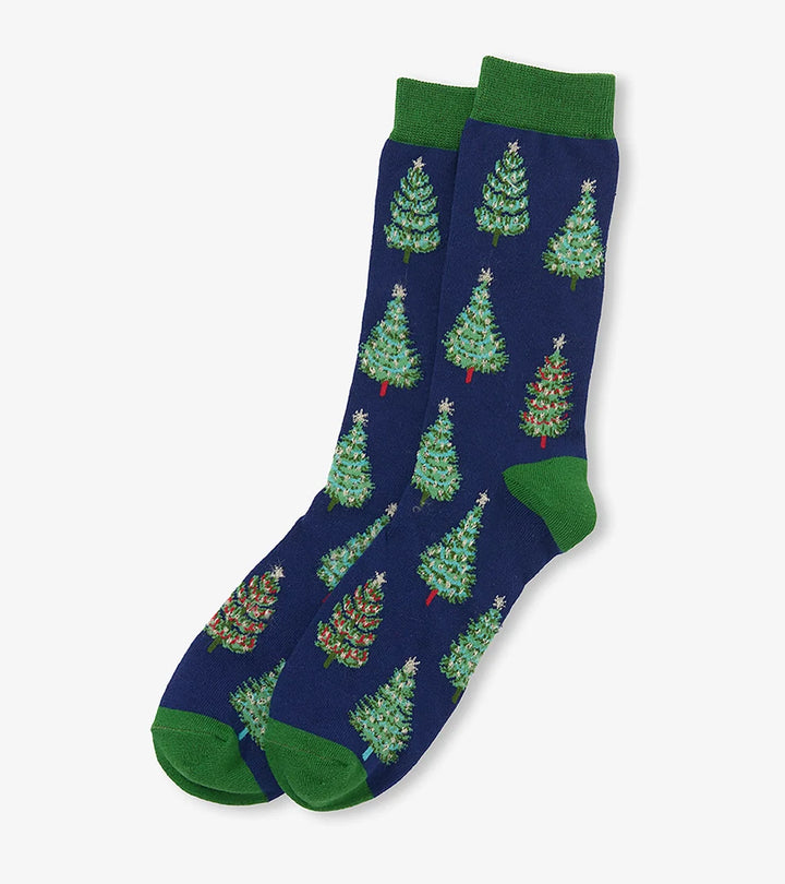 Navy blue socks with green Christmas tree pattern on a white background