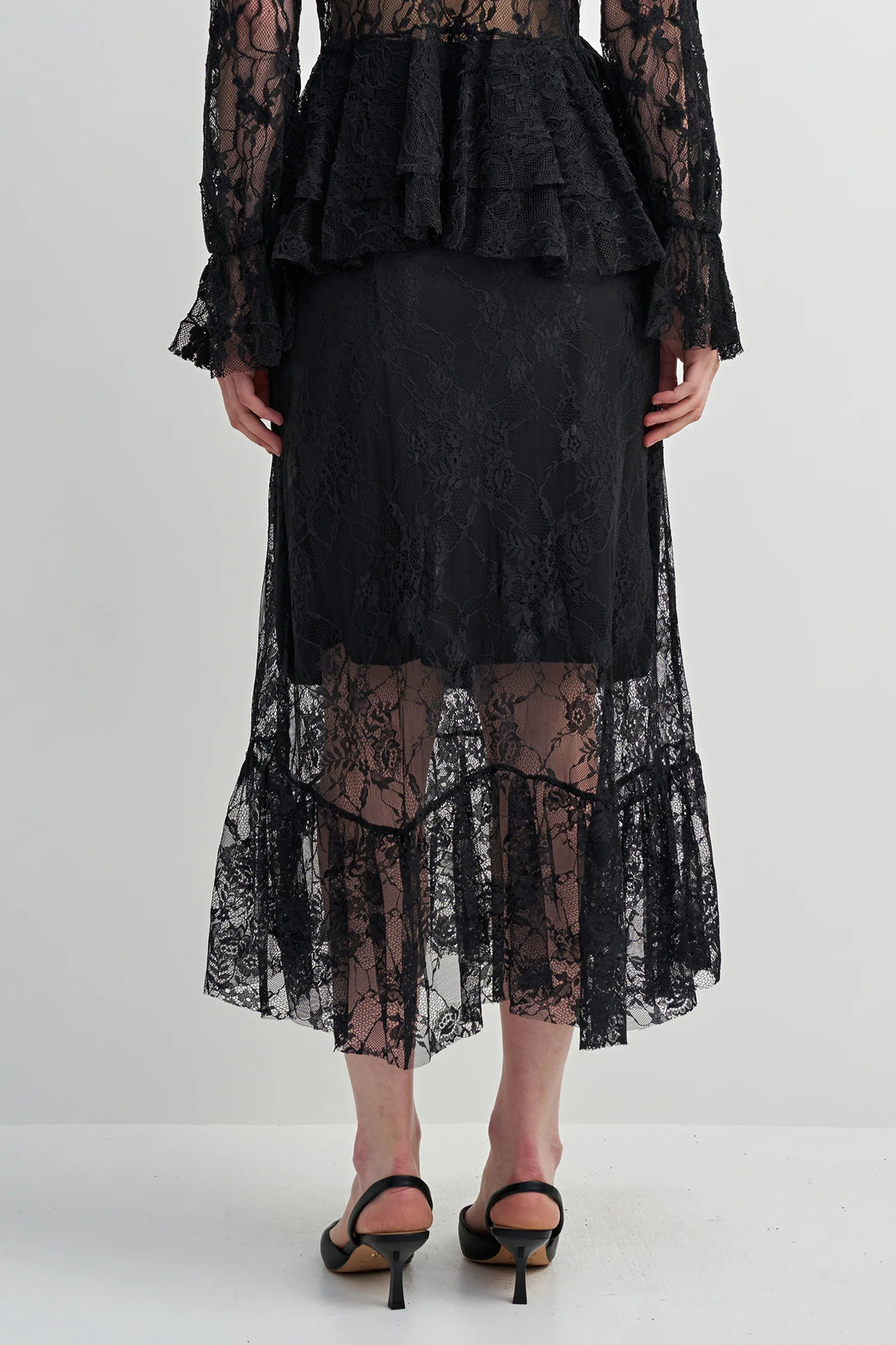 Black lace dress on a white background