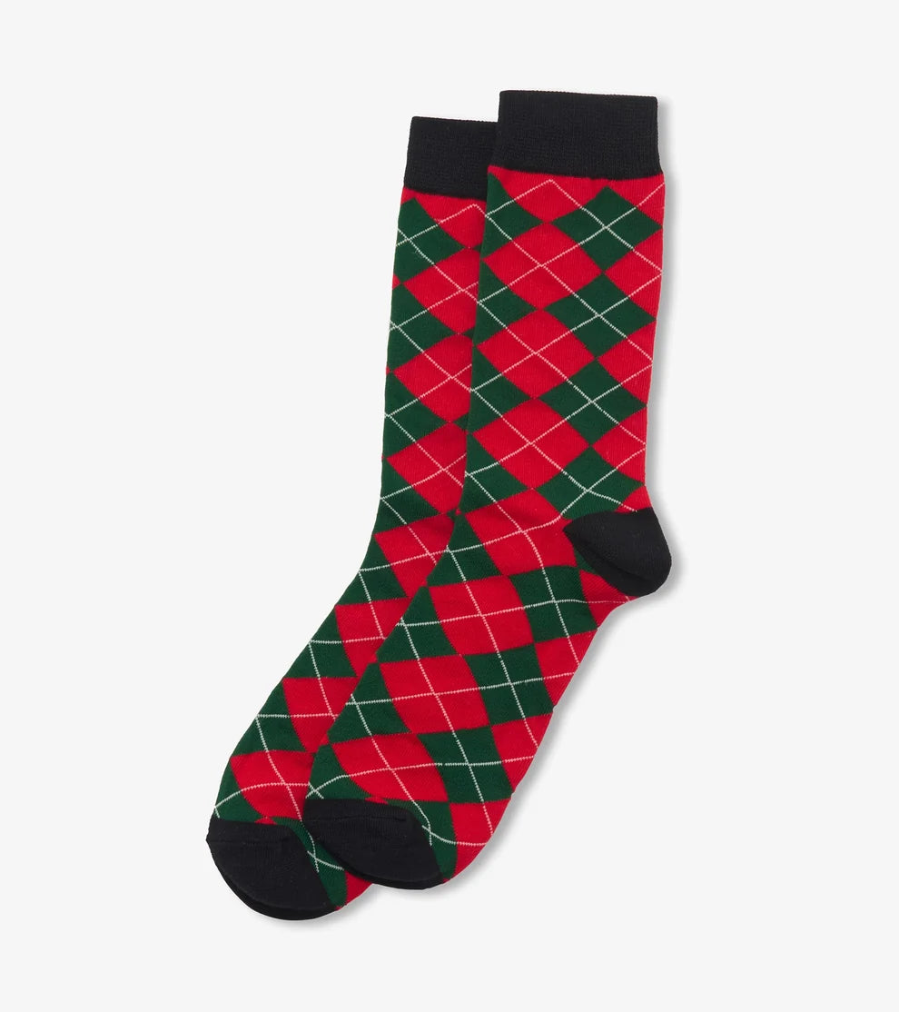 A pair of crew socks with a red and green argyle pattern, featuring solid black heels, toes, and cuffs, displayed on a light gray background.
