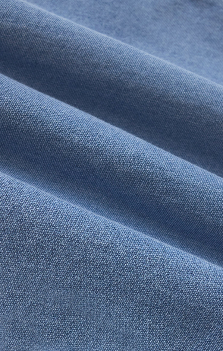 Close-up of blue fabric with a soft texture