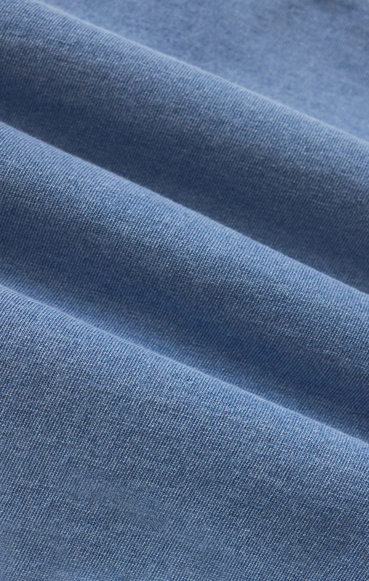 Close-up of blue fabric with a soft texture