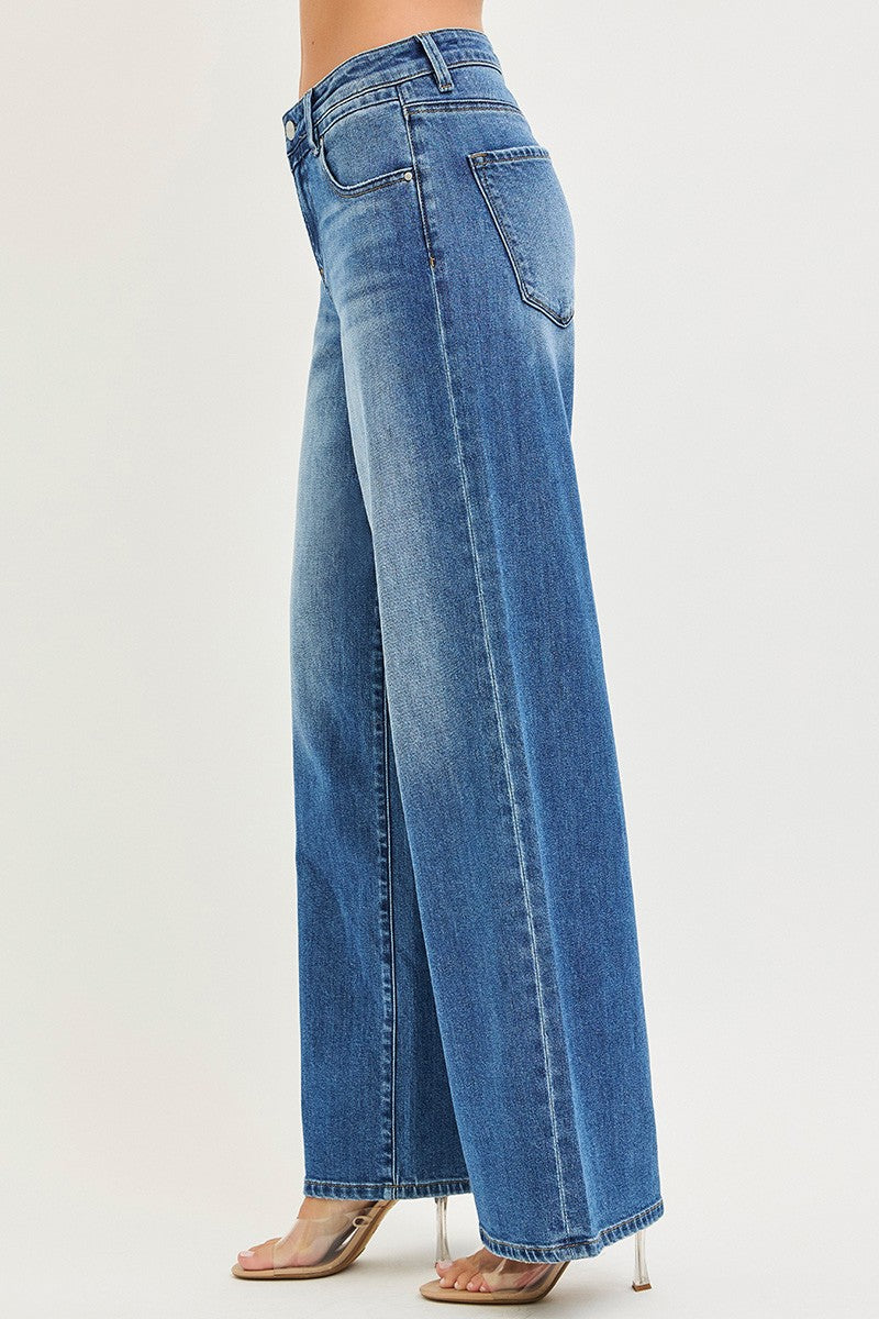 Blue wide-leg jeans on a white background