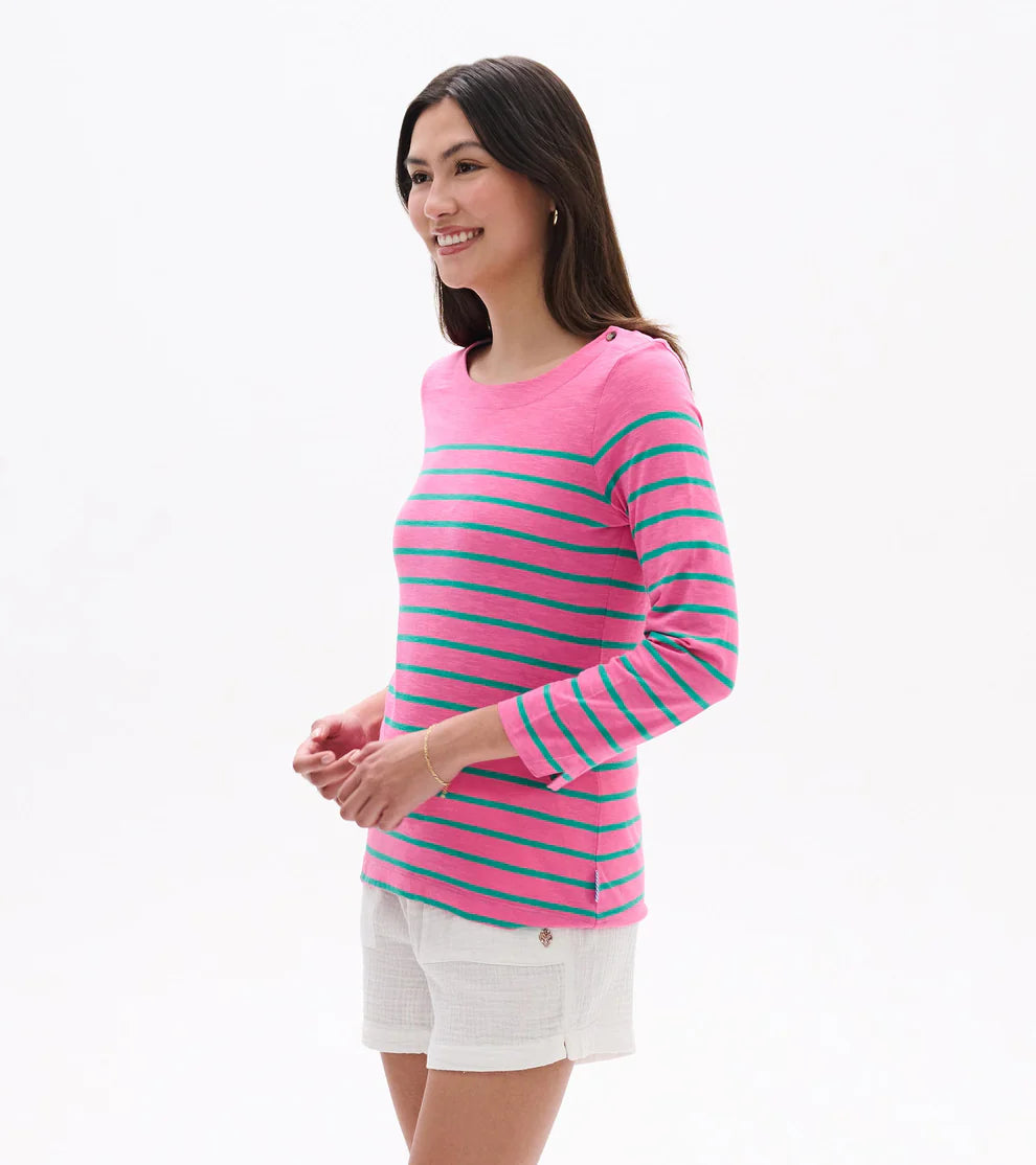 Woman wearing a pink and blue striped sweater on a white background