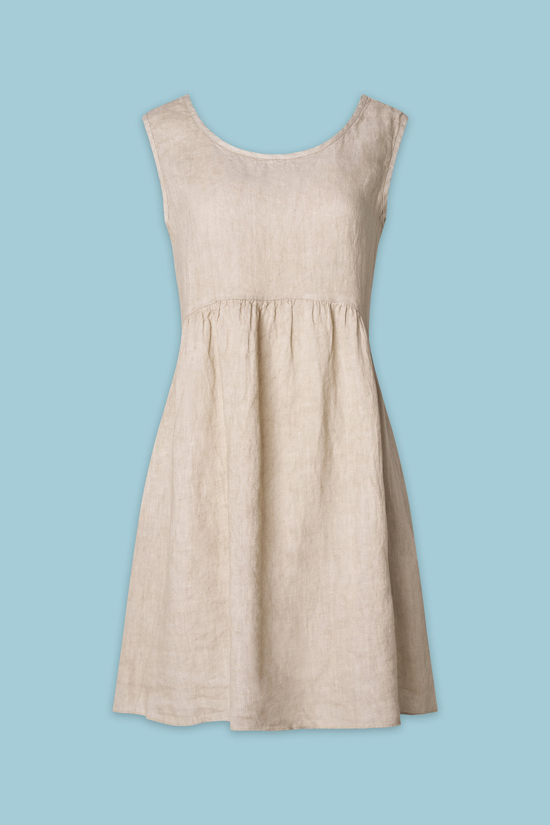Beige dress on a light blue background