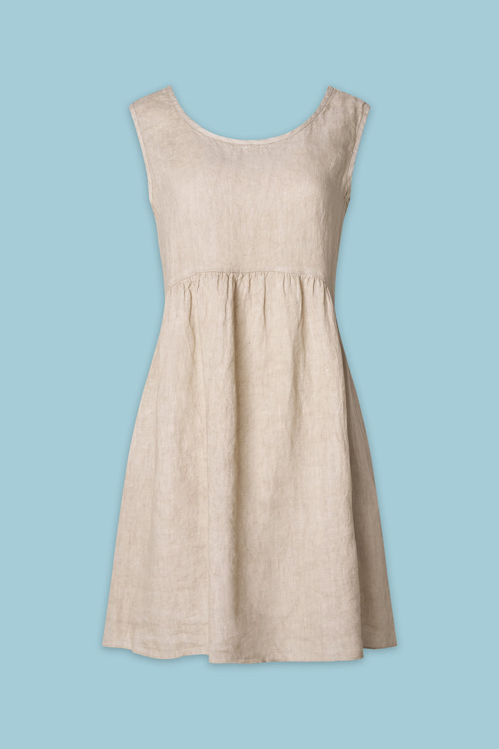 Beige dress on a light blue background