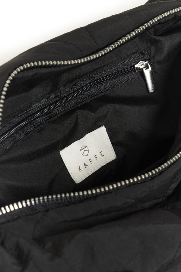 Black bag with a Kaffe label on a white background