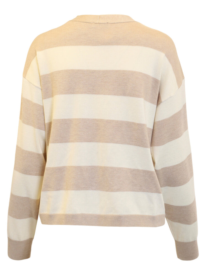 Beige and white striped sweater on a white background
