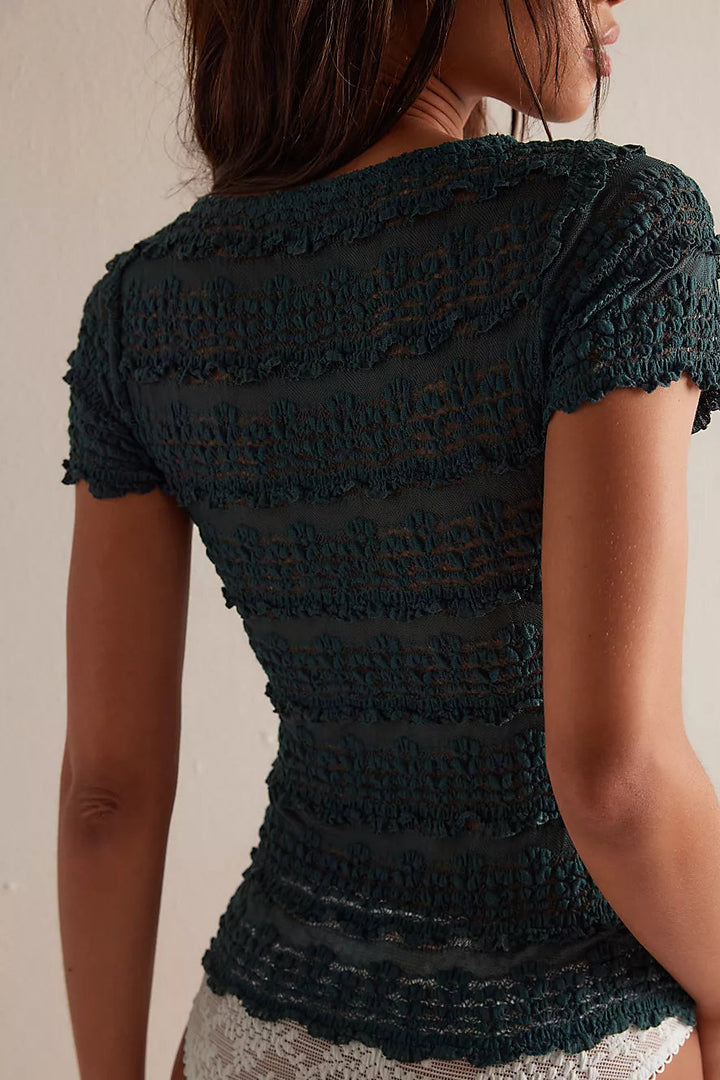 Woman wearing Free People Angelina Lace Tee