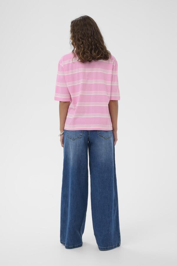 Person wearing a pink and white striped shirt and blue jeans on a white background