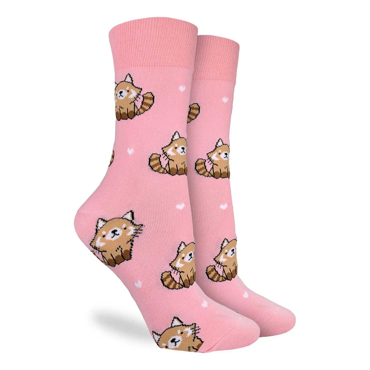 Pink socks with cartoon raccoon designs on a white background