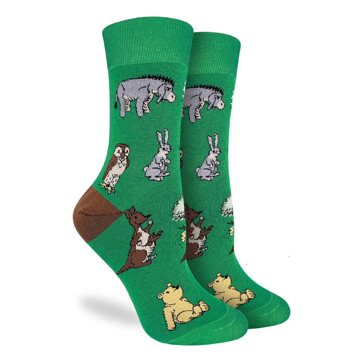 Green socks with animal patterns on a white background
