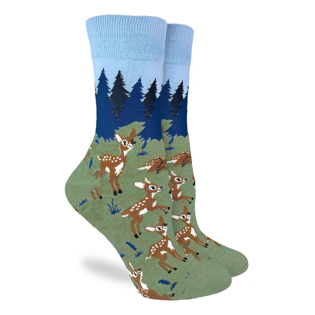 Socks with deer and forest design on a white background