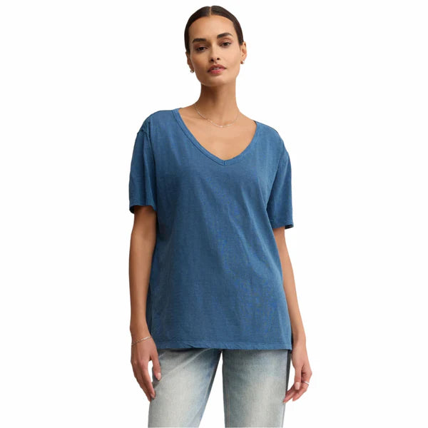 Woman wearing a blue t-shirt on a white background