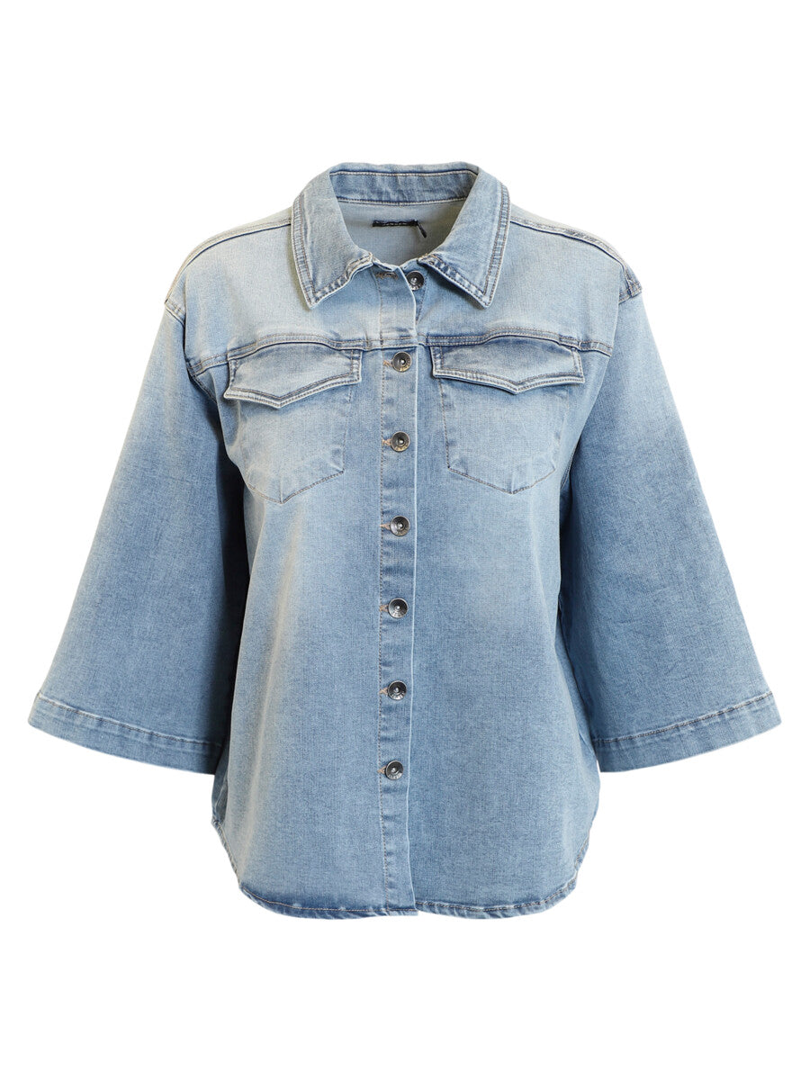 Light blue denim jacket on a white background