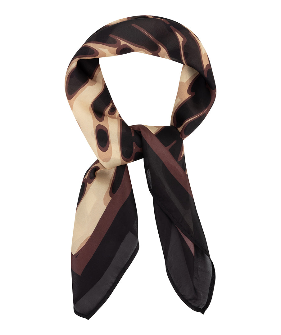 A lightweight silk scarf featuring an abstract wavy pattern in beige, brown, and black, styled in a loop with the ends hanging down against a plain white background.