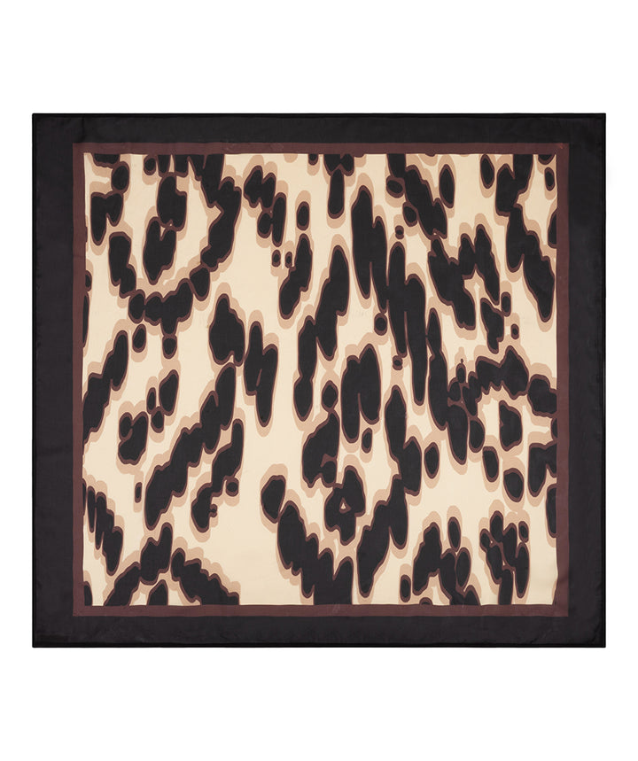 Leopard print pattern on a beige background with a black border
