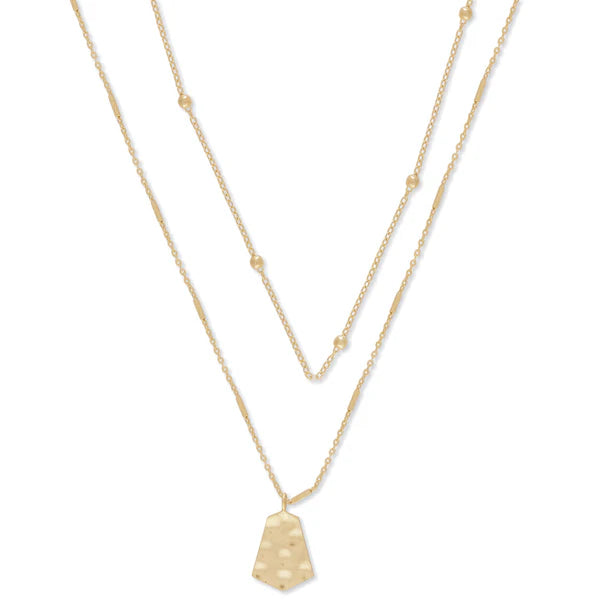 Gold necklace with a pendant on a white background