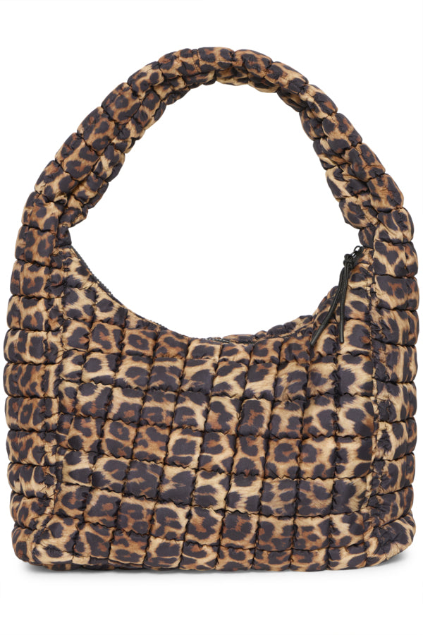 Leopard print handbag on a white background