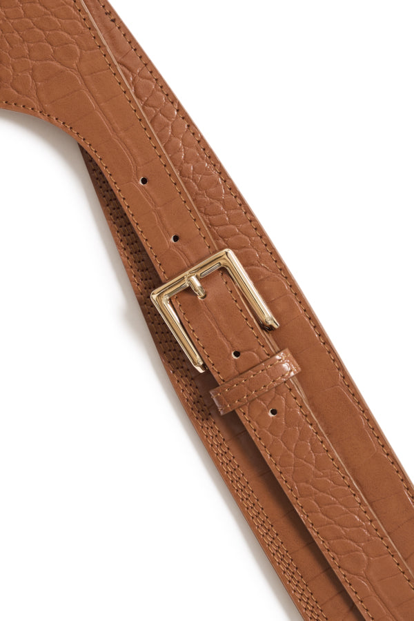 Brown leather belt with a gold buckle on a white background