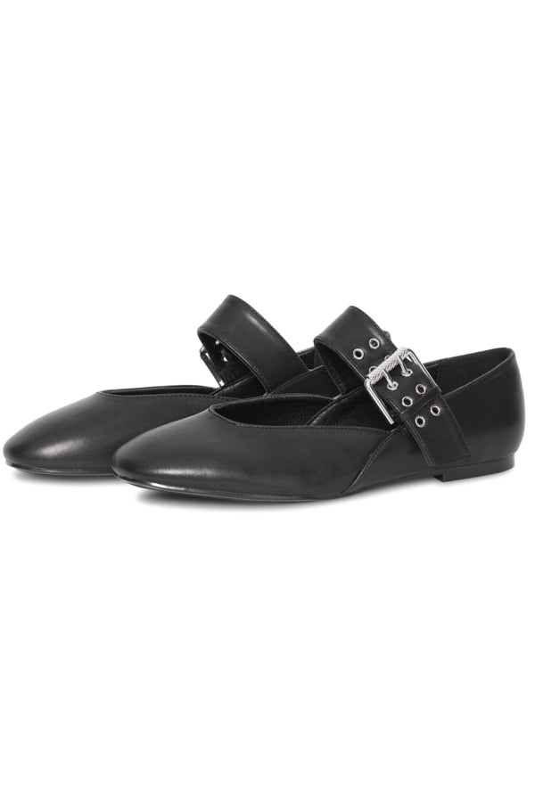 Black leather shoes with a strap on a white background