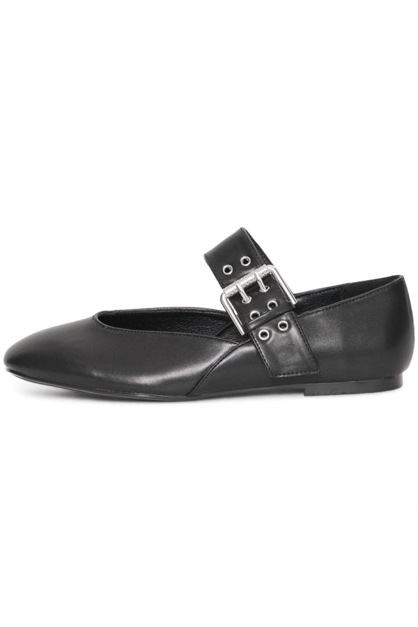 Black leather flat shoe with a buckle on a white background