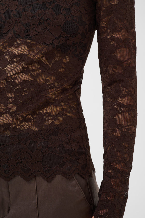 Brown lace long-sleeve top on a white background