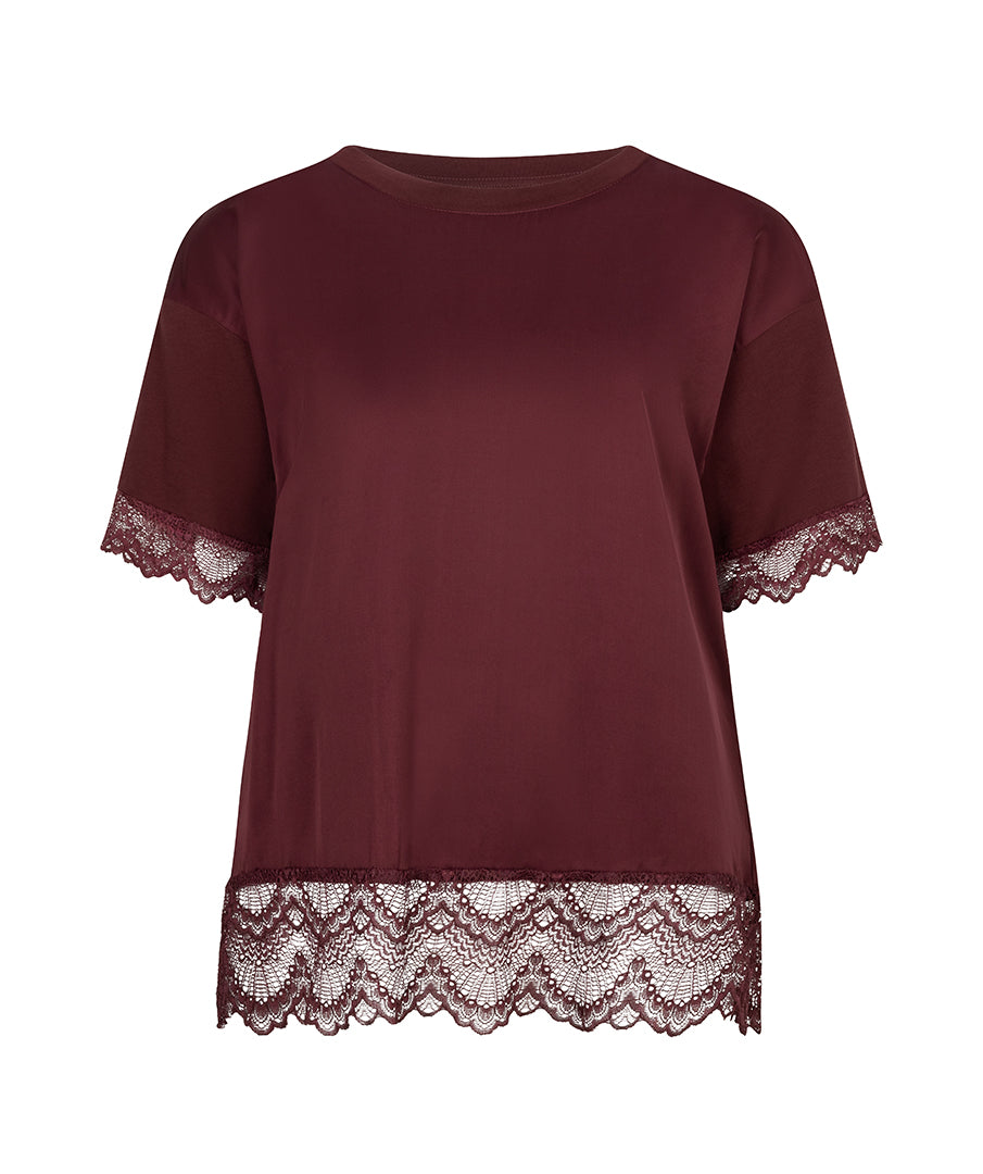 A short-sleeve crewneck top in deep burgundy, featuring sheer mesh sleeves with lace trim at the cuffs and a matching lace hem.