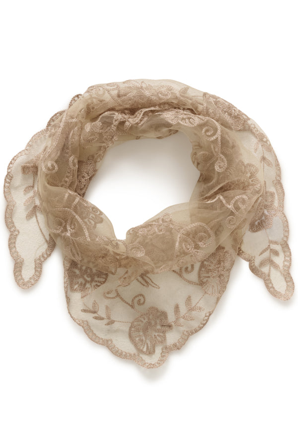 Beige lace scarf on a white background