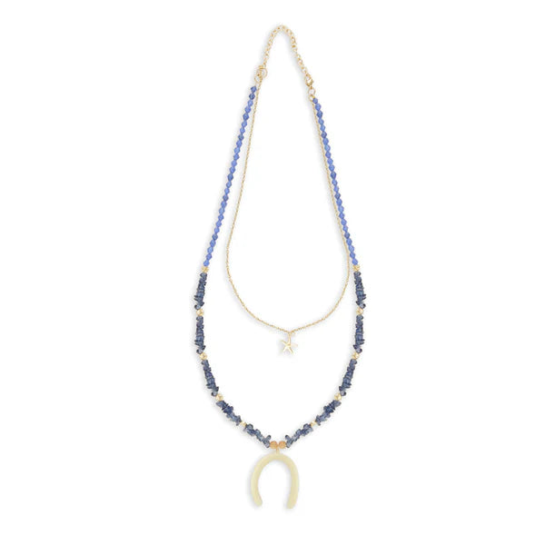 Necklace with blue beads and a star pendant on a white background