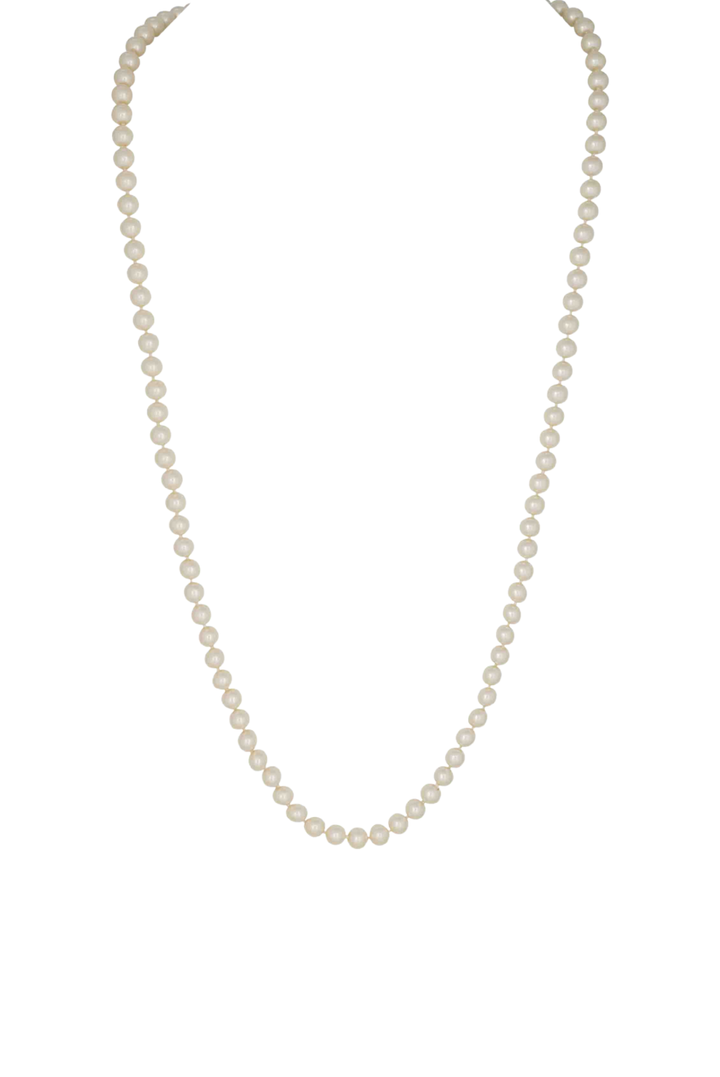 A classic long strand pearl necklace with uniform oval-shaped cream-colored beads, displayed against a solid white background.