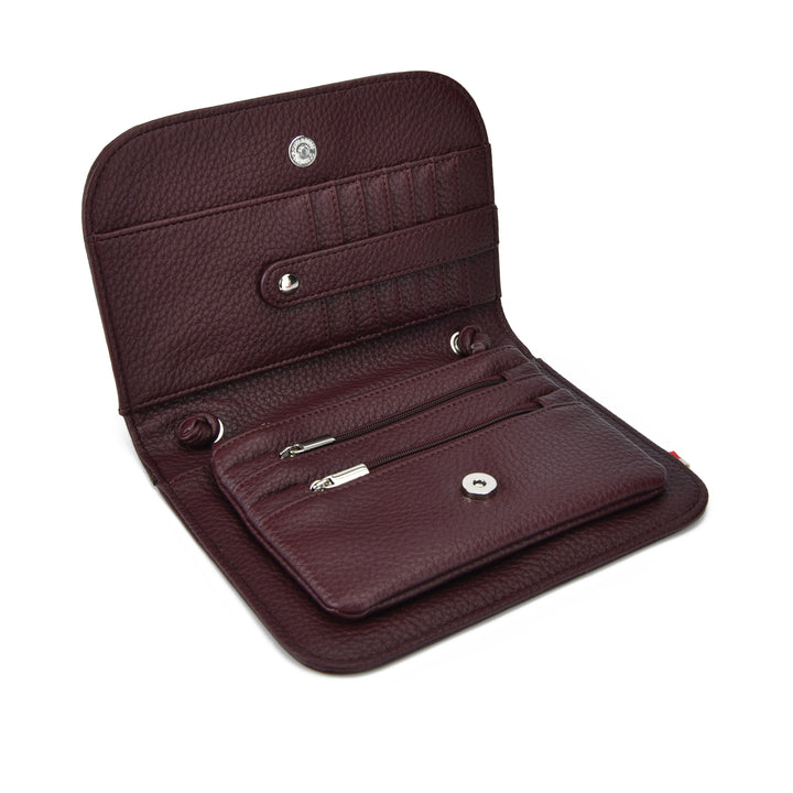 An open pebbled leather wallet in a deep burgundy color, showing its interior compartments, card slots, and silver-tone hardware against a plain white background.