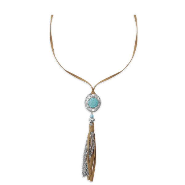 Necklace with turquoise stone and tassel on a white background