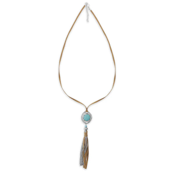 Necklace with turquoise pendant and tassel on a white background