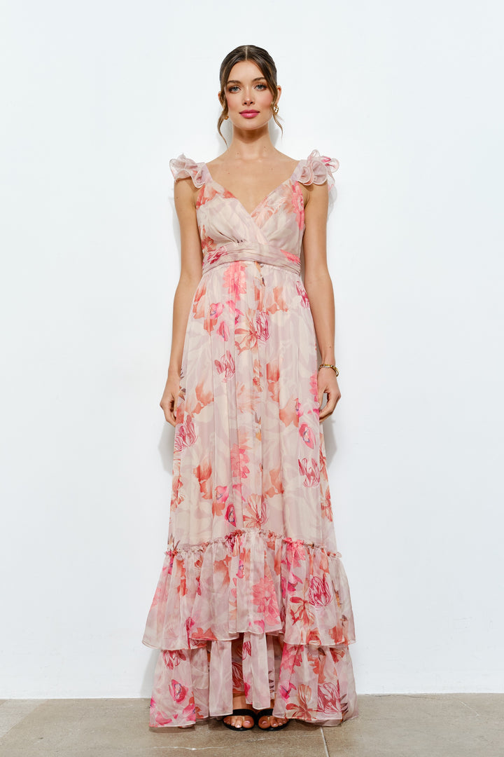 Woman wearing a floral dress on a white background