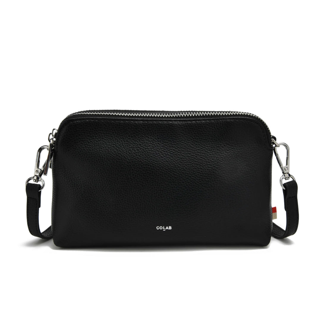 Black leather crossbody bag with a visible brand logo on a white background