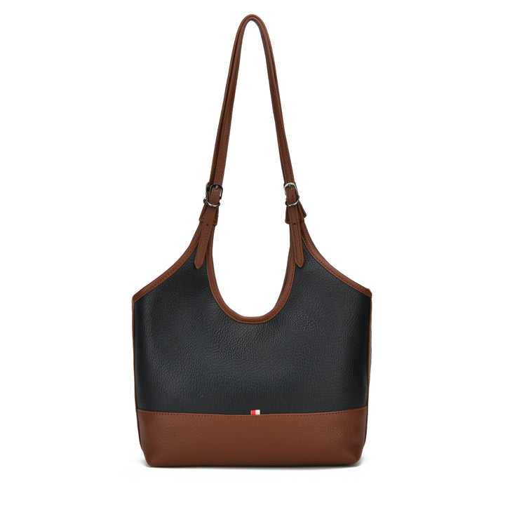A colorblock leather shoulder bag with a black pebbled upper body, brown base, and brown shoulder strap, shown on a plain white background.