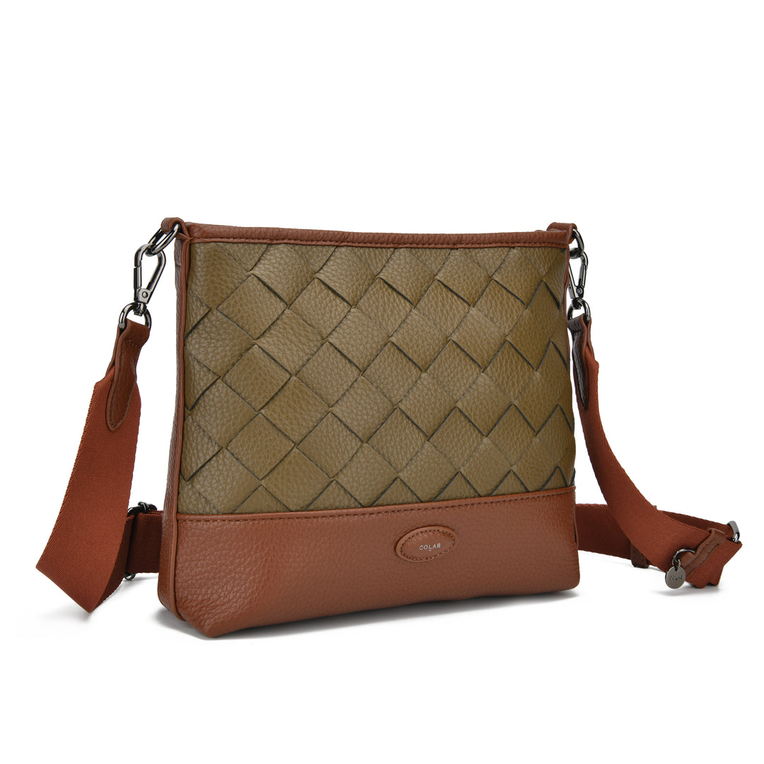 A brown and olive green leather crossbody bag with a woven basketweave pattern on the front, a solid brown leather base, and a matching adjustable shoulder strap, shown on a white background.