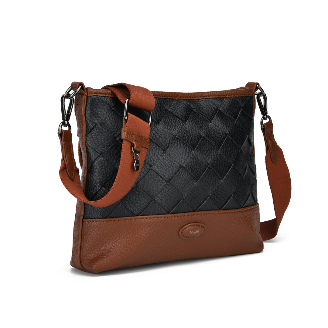 A brown and black faux leather shoulder bag with a woven black pattern on the upper half, a brown pebbled leather base, and a matching brown shoulder strap, shown on a white background.