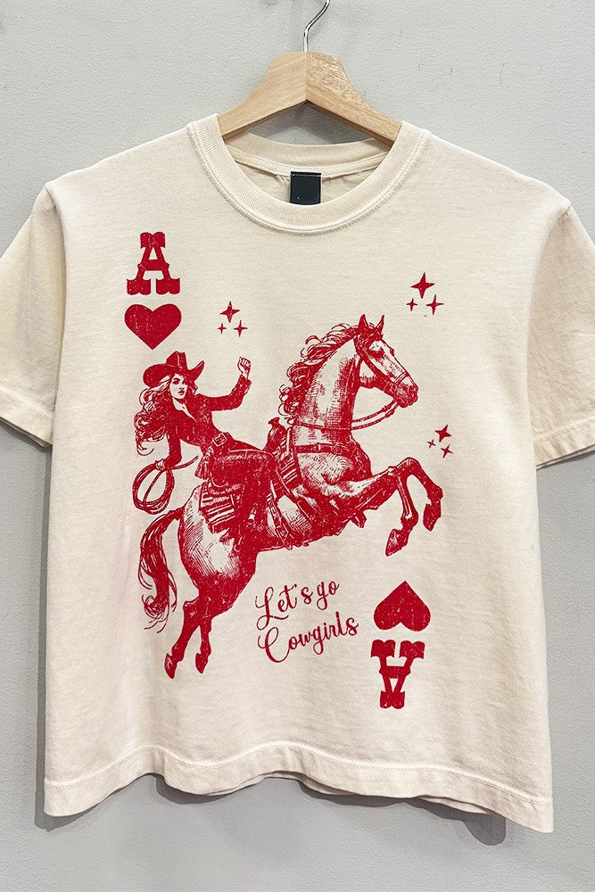 Beige t-shirt with red graphic of a cowgirl on a horse and text &