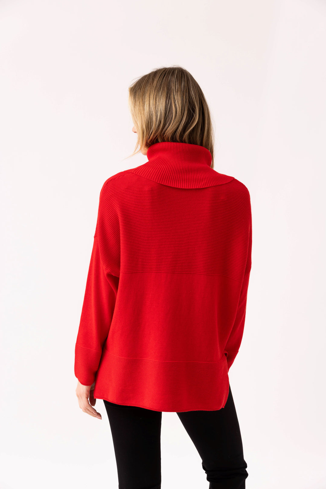 Person wearing a red jacket on a white background