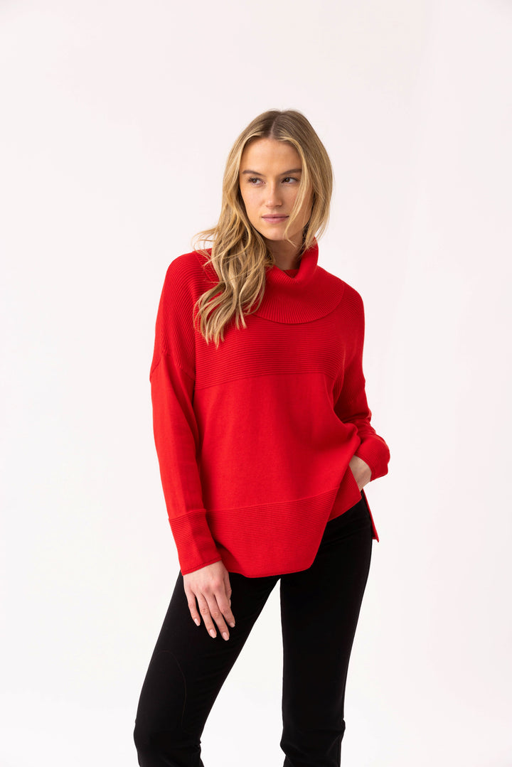 Woman wearing a red sweater on a white background