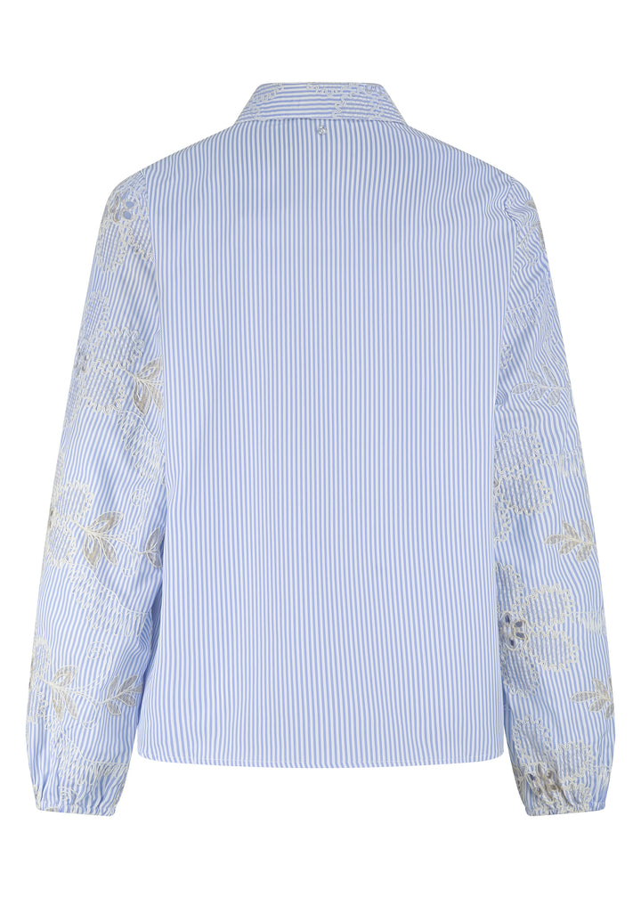 Light blue striped shirt with floral embroidery on sleeves against a white background