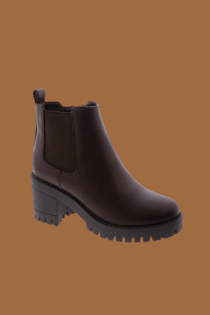 Brown Chelsea boot on a white background