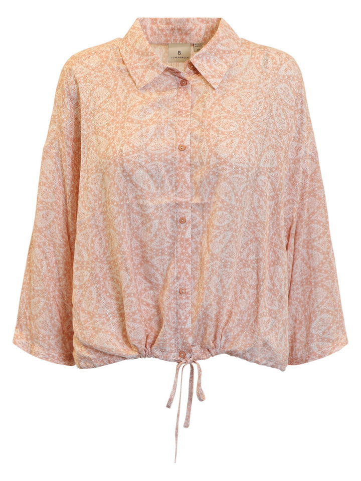 Pink floral blouse with long sleeves on a white background