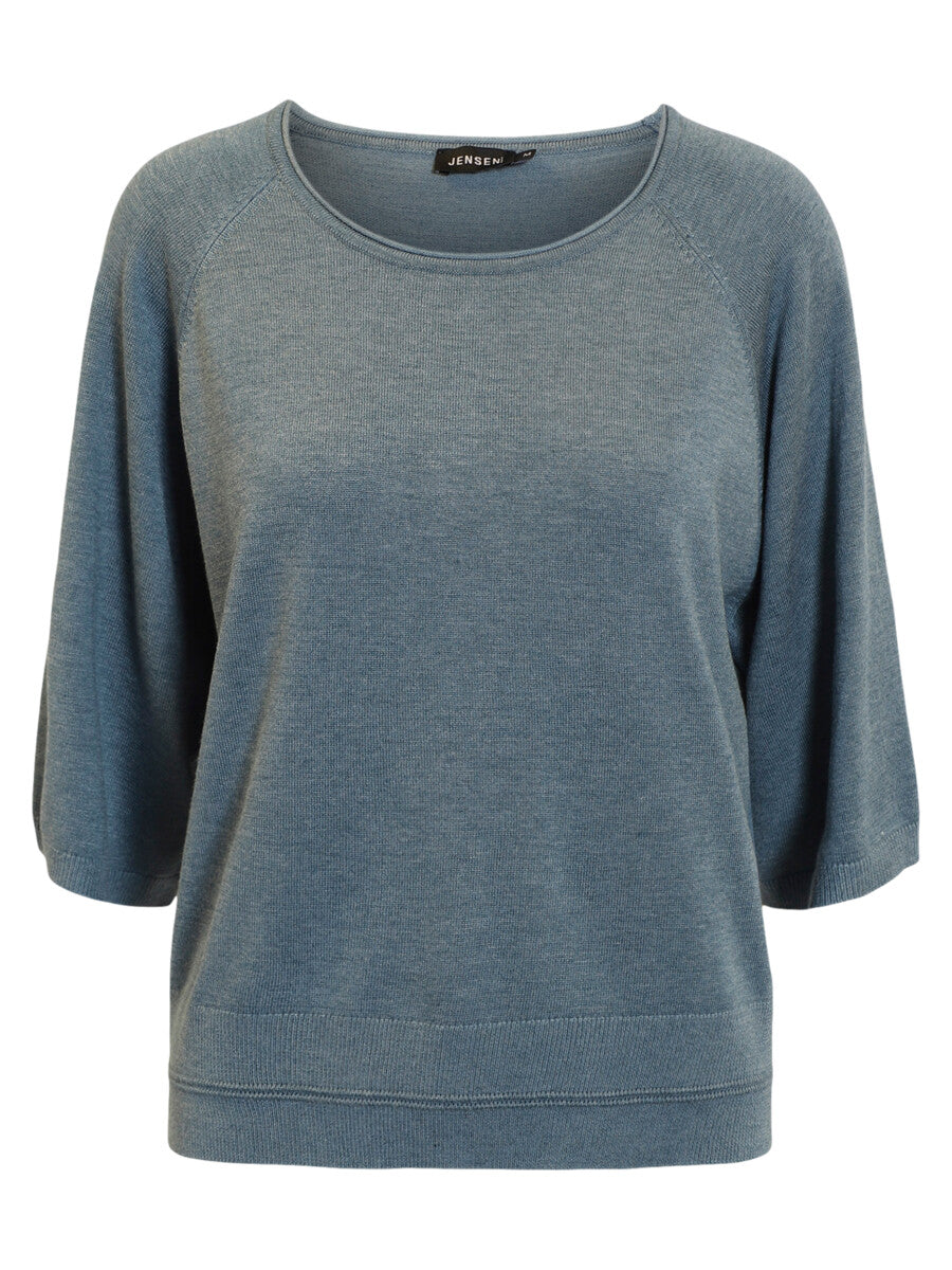 Green sweater on a white background