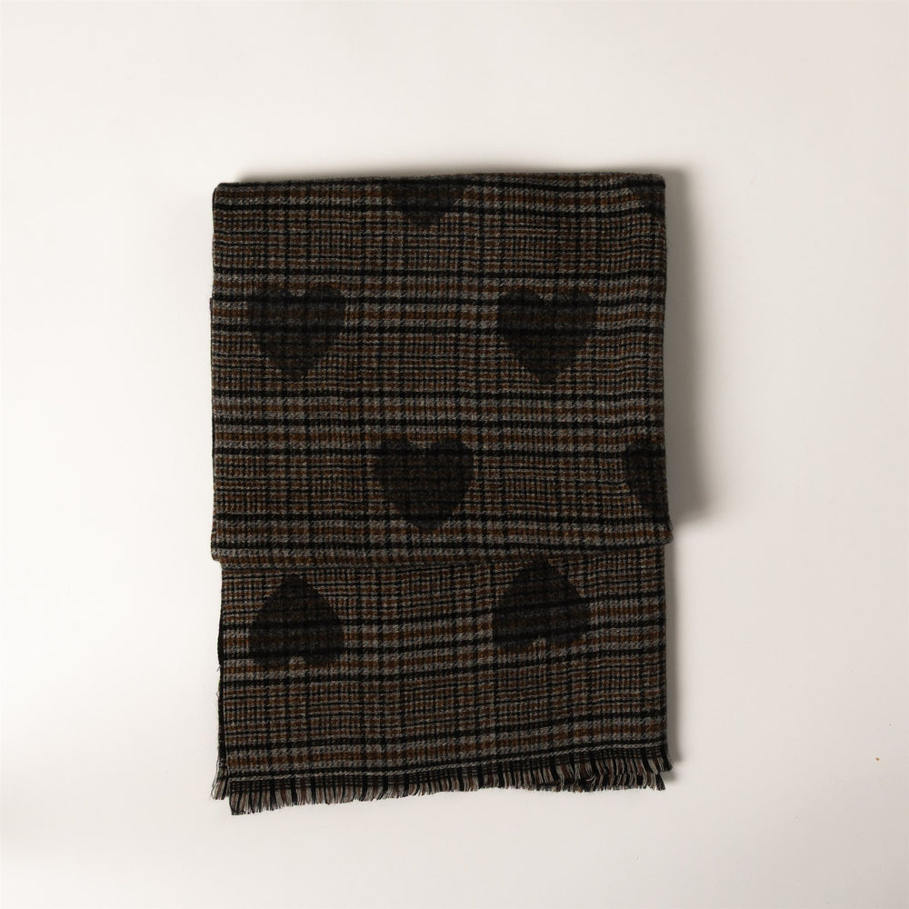 A folded plaid scarf in black and brown with a repeating heart pattern, displayed on a clean white background.
