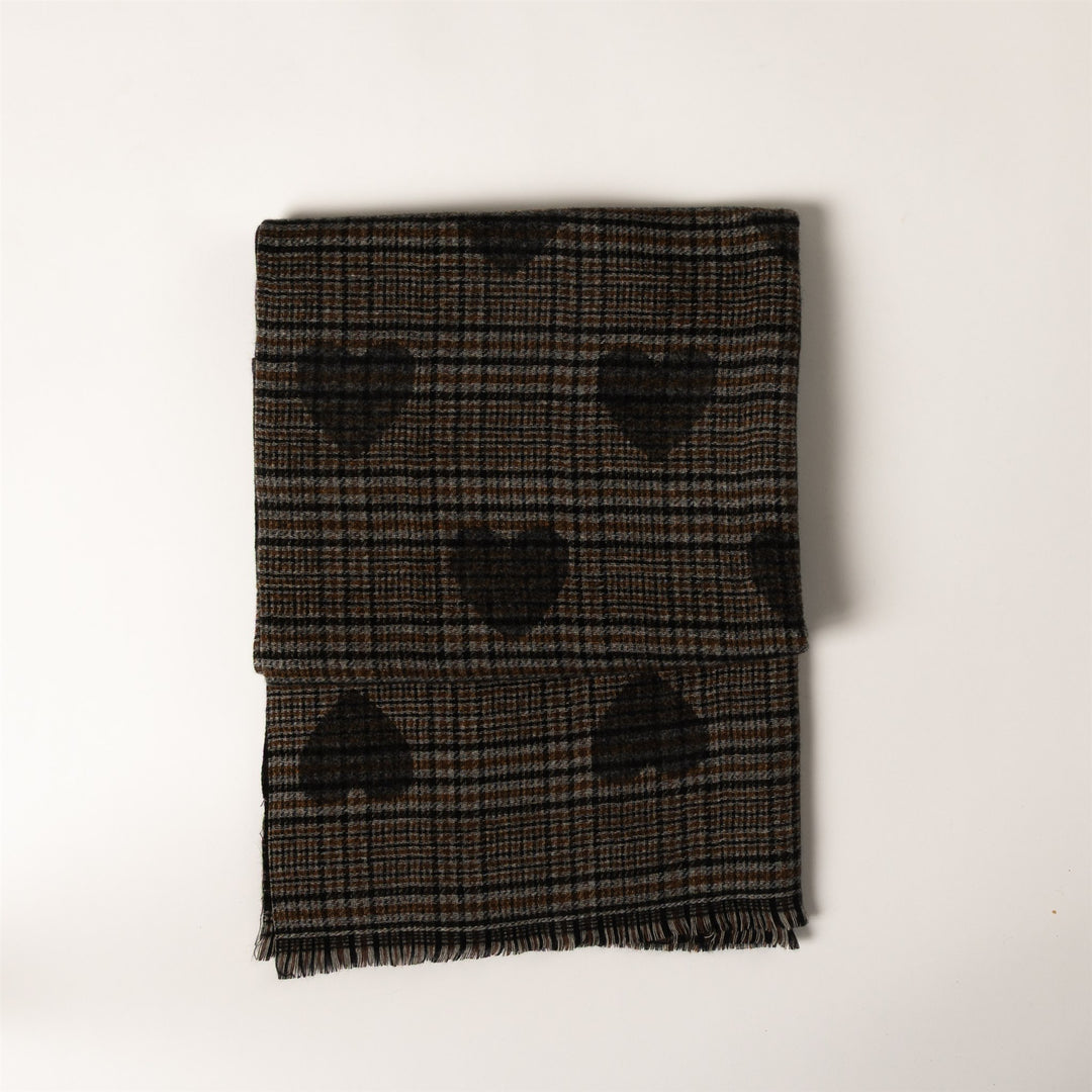 A folded plaid scarf in black and brown with a repeating heart pattern, displayed on a clean white background.