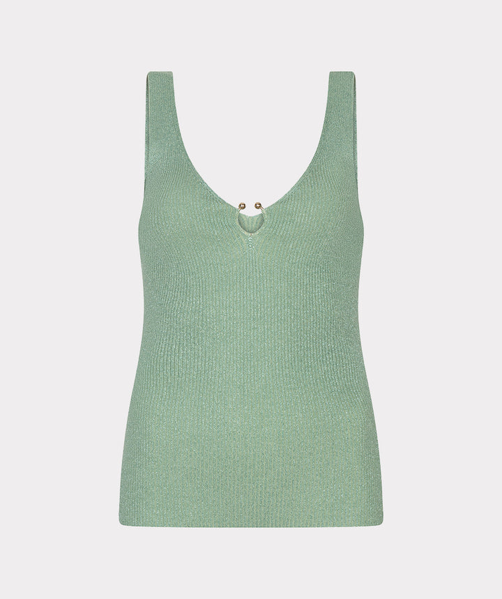 Green tank top on a light gray background