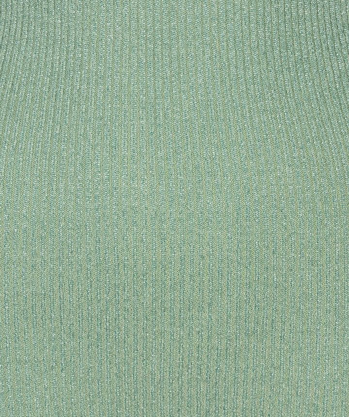 Close-up of a textured green fabric surface